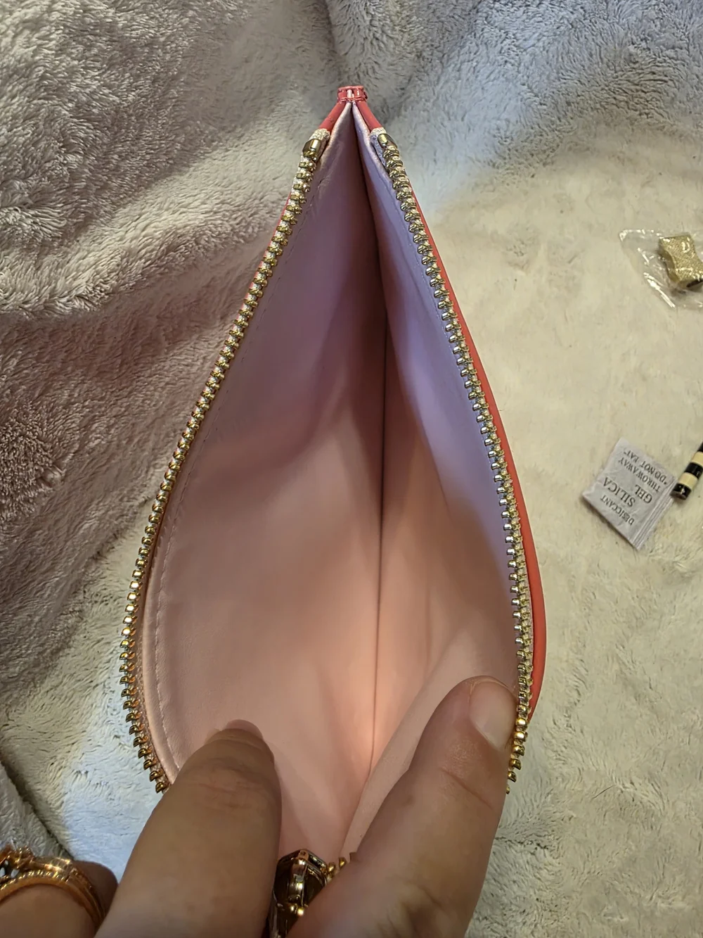 kate spade glossy hot pink zip pouch with gold logo